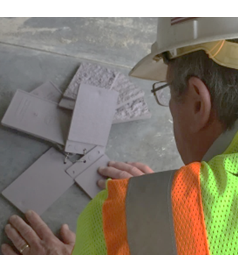 Inspector viewing prepared concrete profile